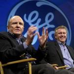 General Electric chairman and CEO Jack Welch (left) spoke during a news conference with his designated successor, Jeff Immelt, at his side.